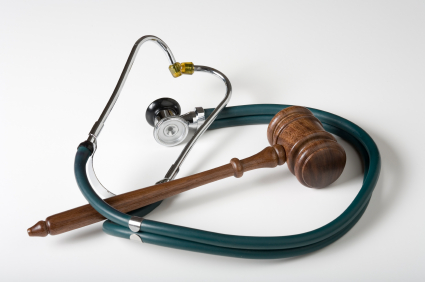 Gavel and Stethoscope on white background. New York Social Security Disability Law Firm